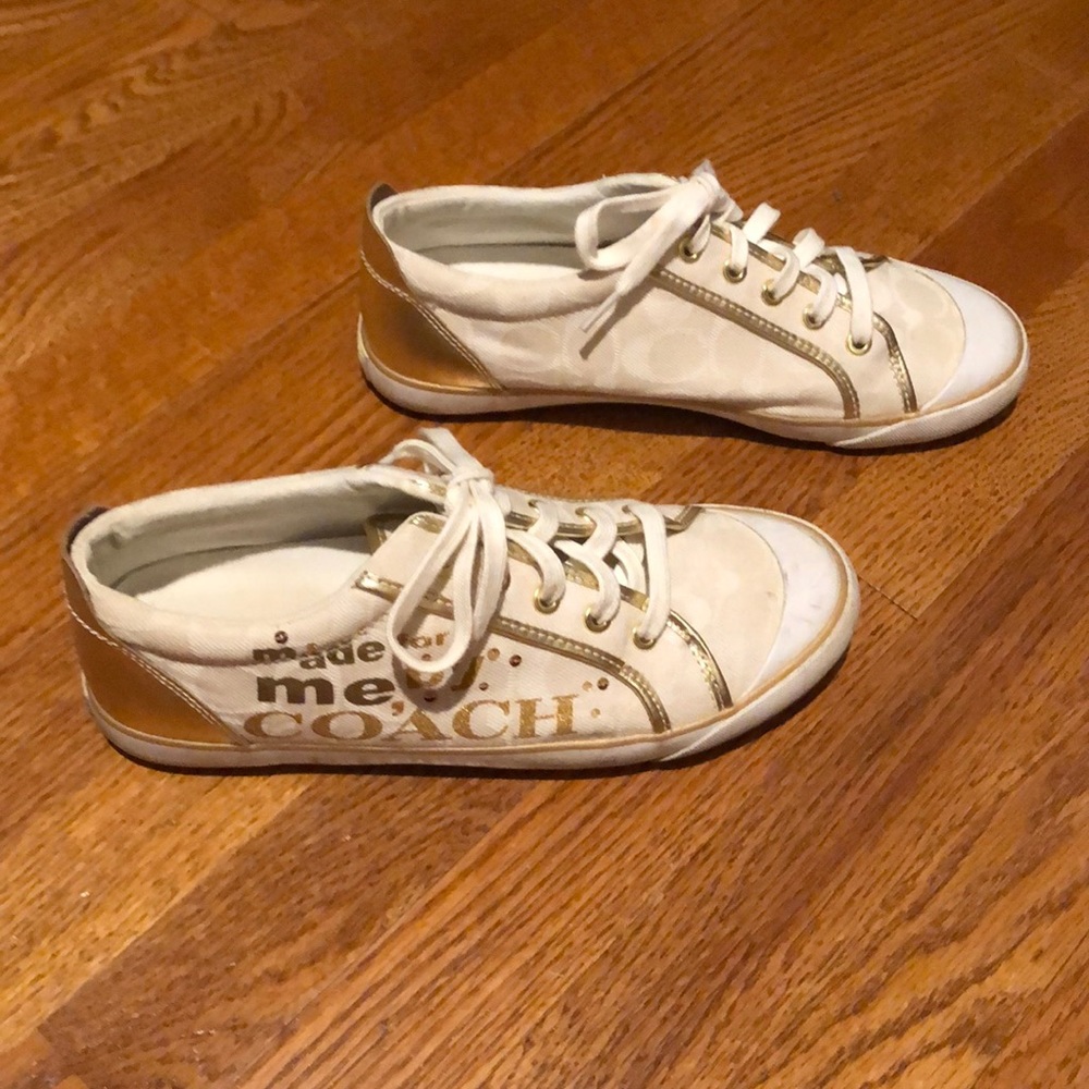 Gold and white Coach sneakers